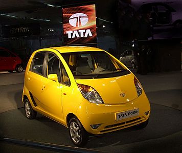 Shown here is the Tata Nano, the world's least expensive car.[159] Sanand, Gujarat, is home to Tata Nano.