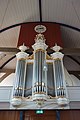 Orgel (Flaes en Brünjes) met erboven de onderzijde van de toren (dat rust op het orgel)