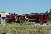 Texas State Railroad caboose No. 129 and passenger car No. 50