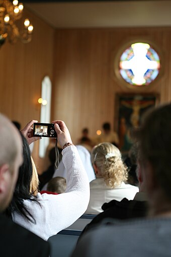 Digital point-and-shoot camera using live preview for a picture in a church in Norway