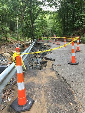 A road in Maryland damaged by seasonal flooding