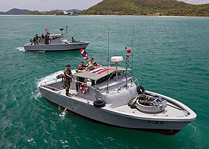 Royal Thai Navy Riverine Sailors on patrol boats