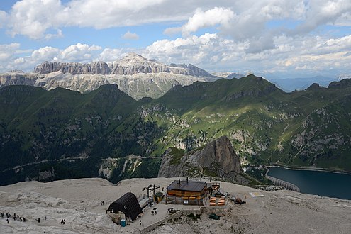 Rifugio Pian dei Fiacconi and a view to Col de Bousc, Padon mountain chain and Sella group