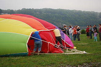 Top of balloon during inflation. Crew is securing parachute vent. Setting up hot air balloon, Poughkeepsie, NY 2.JPG