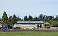 English: Pie Shop at Sheffield, New Zealand. The Midland Line, New Zealand is in the foreground.