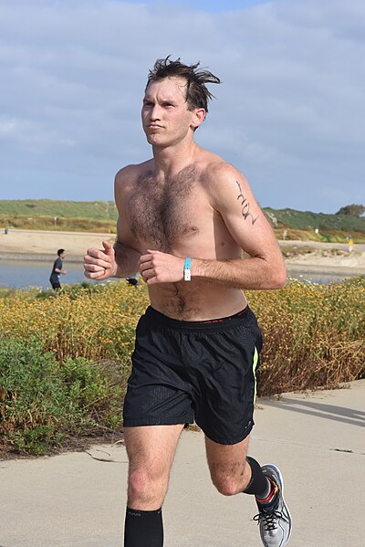 File:Shirtless Runner in Casual Shorts (48855595176).jpg