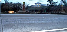 Saint Tammany Hall (background) is the first building students pass on going through the main entrance to Southeastern Louisiana University in Hammond, Louisiana. Southeastern main entrance LA 3234.JPG