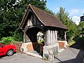 The lychgate outside the Church of Saint Dunstan in Cheam, built in 1891. [13]