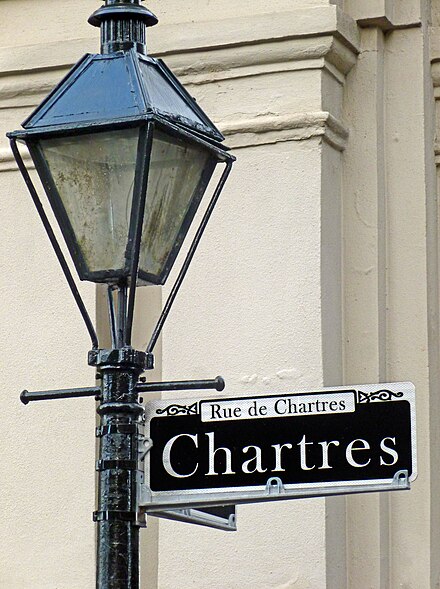A streetlight and sign in the French Quarter section of New Orleans, LA.