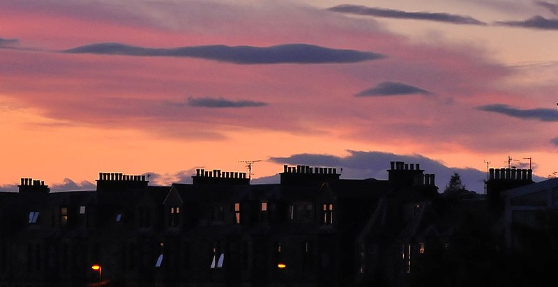 File:Sunset over the chimneys (3705626060).jpg