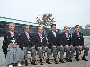 Takakura (far right) received the Order of Culture on November 5, 2013.