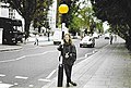 Teenage Beatles fan with the belisha beacon on Abbey Road.jpg