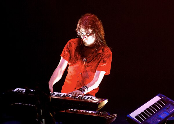 Holopainen performing keyboards during a Nightwish concert