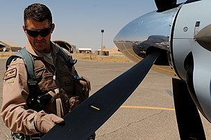 Lt. Col. Hamann, 52nd Expeditionary Flying Training Squadron commander, performs a preflight visual inspection at Camp Speicher, Sept. 4, 2011 Turning over operations 110904-F-ZB240-696.jpg
