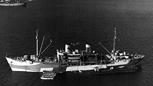 USS Fergus (APA-82) at anchor, in February 1945 (19-LCM-APA82-1).jpg