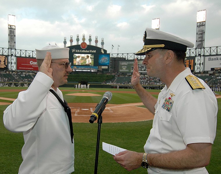 File:US Navy 080604-N-8848T-071 Rear Adm. Jon W. Bayless, right, the commander of Navy Region Midwest, reenlists Navy Counselor 1st Class Sean Nagle at U.S. Cellular Field.jpg