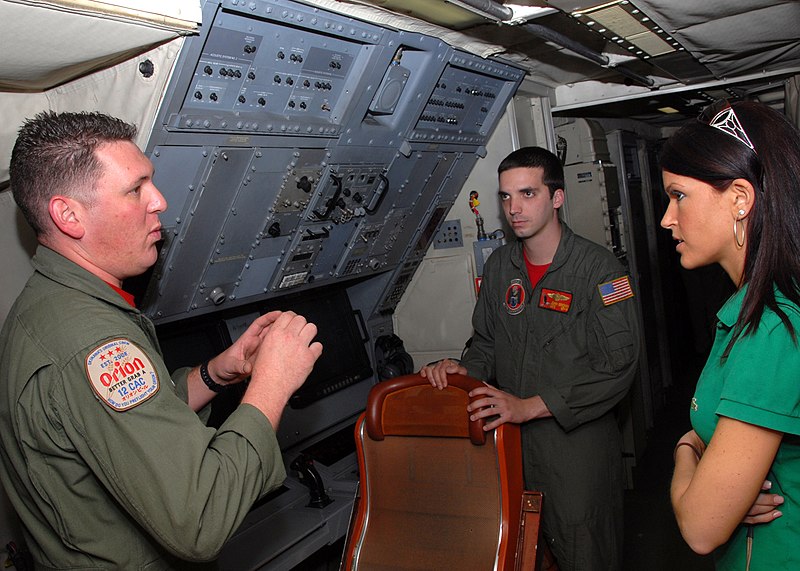 File:US Navy 090314-N-3013W-045 Naval Air Crewman 1st Class Adam Herzog explains the acoustic equipment of a P-3C Orion aircraft assigned to Patrol Squadron (VP) 16 to staff members of the U.S. House of Representatives House Armed S.jpg