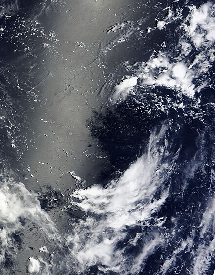 An upper tropospheric cyclonic vortex in the western North Pacific, showing high level cloud tops being sucked in.