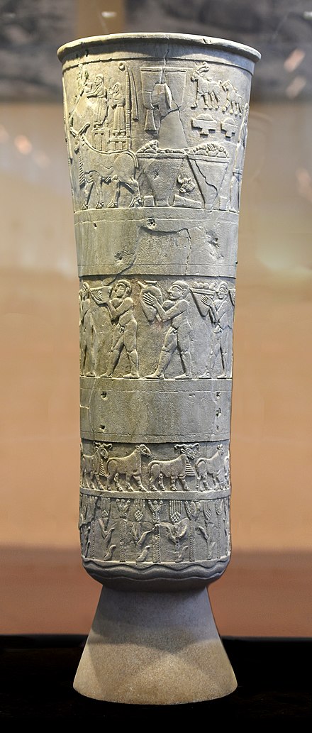The servants of the first states: porters carrying offerings on the Warka Vase, a great alabaster vase from Uruk, National Museum of Iraq.