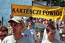 Kashubian jamboree in Leba in 2005 - banner showing the Kashubian name of Kartuzy County Zendzenie kaszebow leba kartuze.jpg