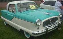 Two toned, green and white 1957 Nash Cosmopolitan at an auto show