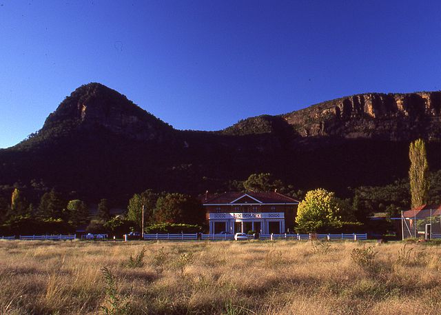 Part of Glen Davis, with a backdrop of the Wollemi National Park. The hotel is at the centre of the photograph.