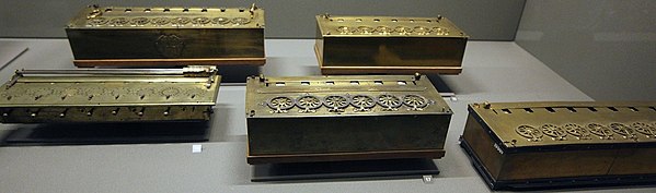 Four of Pascal's calculators and one machine built by Lépine in 1725, Musée des Arts et Métiers