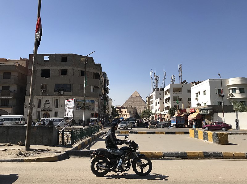 File:A man travels on a motorcycle in Giza town, Cairo Egypt.jpg