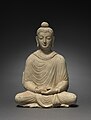 Boudha de Hadda, sculpté vers 300, typique de la posture assise : les deux pieds étant recouverts de la poitrine et les mains se tenant doucement dans le geste de méditation, en s’appuyant sur son tour. Actuellement au Cleveland Museum of Art.