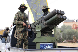 Members of Al-Quds brigades parade through Gaza