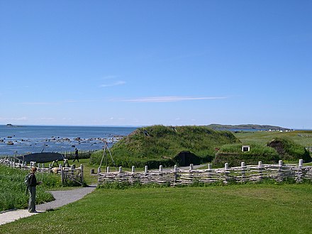 A reconstruction of Norse buildings at the UNESCO listed L'Anse aux Meadows site in Newfoundland, Canada. Archaeological evidence demonstrates that iron working, carpentry, and boat repair were conducted at the site.[42]