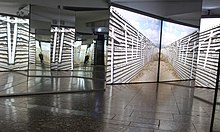 The Hall of Mirrors at the Borderland Museum Eichsfeld shows pictures and short films of borders around the world. Borderlandmuseum exhibition 1.jpg