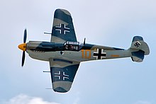 An Hispano Aviacion HA-1112 marked as a Messerschmitt Bf 109 showing the standard German crosses worn during World War II. Buchon - Duxford (30045908557).jpg