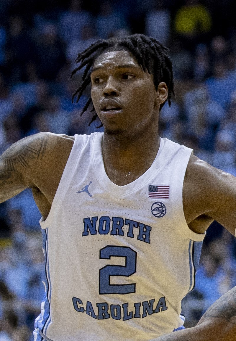 Four-star point guard recruit commits to UNC basketball over Michigan