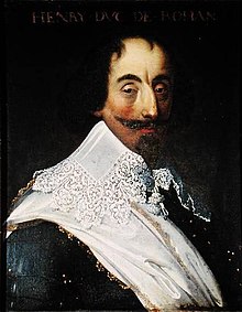 Old portrait of a man with a lacy collar, mustache and pointed beard