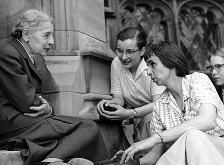 Meitner with students on the steps of the chemistry building at Bryn Mawr College in April 1959