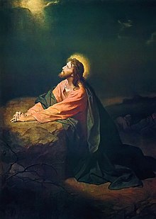 Dans la nuit, le Christ seul en prière au jardin des Oliviers