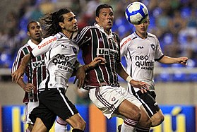 Andre of Brazil's Fluminense heads the ball during a Copa Libertadores  Group D soccer match against Peru's Sporting Cristal at Maracana stadium in  Rio de Janeiro, Brazil, Tuesday, June 27, 2023. (AP