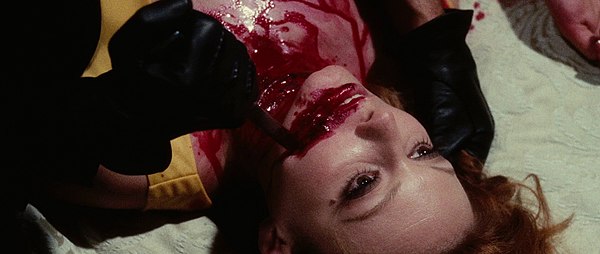 A scene from Death Walks on High Heels (1971) showing excessive violence associated with many gialli