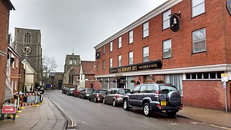 East Dereham, showing the two towers of St Nicholas's Church. The left tower is the belltower.