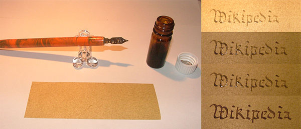 Homemade iron gall ink in use, displaying the delayed darkening of the ink