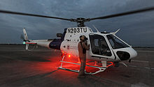 Eurocopter AS-350 A-Star. FEMA - 38886 - Pilots prepare for an aerial tour in Texas.jpg