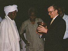 At a farewell ceremony in Khartoum GermanAmbassadorDrWernerDaum KhartoumSudan2000 PhotoByRomanDeckert 02.jpg
