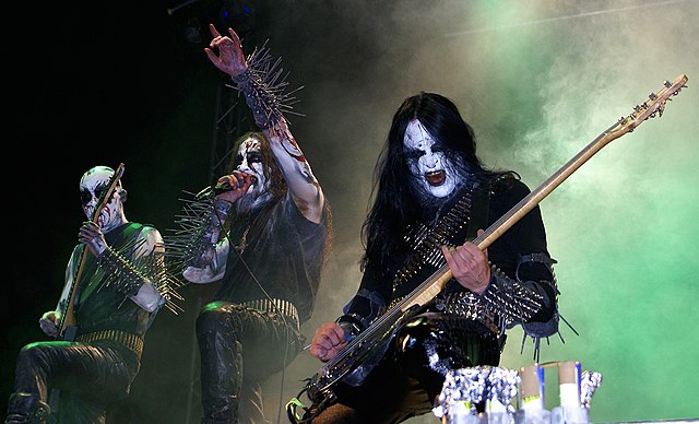 Members of Gorgoroth wearing typical black metal gear such as corpse paint, spikes and bullet belts. The band was formed by guitarist Infernus to expr