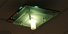 A float glass light fitting. Ordinary float glass is green in thicker sheets due to Fe2+ impurities. Green color of float glass.jpg