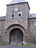 Ensemble van het kasteel, boerderij, kerk en park