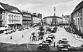 English: Historical postcard with náměstí Adolfa Hitlera (Adolf Hitler Square; nowadays Horní náměstí) in Olomouc. Čeština: Historická pohlednice s náměstím Adolfa Hitlera (dnes Horní náměstí) v Olomouci. Original caption in Czech and German: Olomouc – Náměstí Adolfa Hitlera Olmütz – Adolf Hitler-Platz