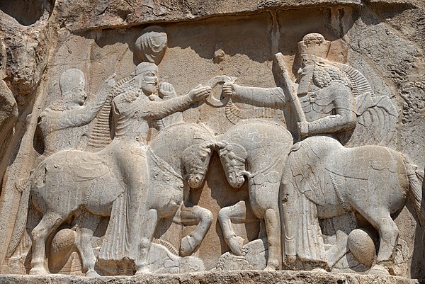 Rock relief of Ardashir I receiving the ring of kingship by the Zoroastrian supreme god Ahura Mazda.