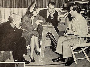 James Gleason, Barbara Stanwyck, Gary Cooper, and Frank Capra xakean, 1940