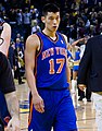 Jeremy Lin with the Knicks and reporters.jpg